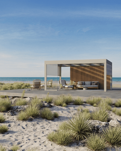 Calista terrasoverkapping in crèmewit op een strandlocatie, met Kozma wandpaneel en buitenlounge — gepersonaliseerd in elke RAL-kleur